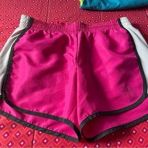 Shorts are pink,black and white.The brand is Danskin now .